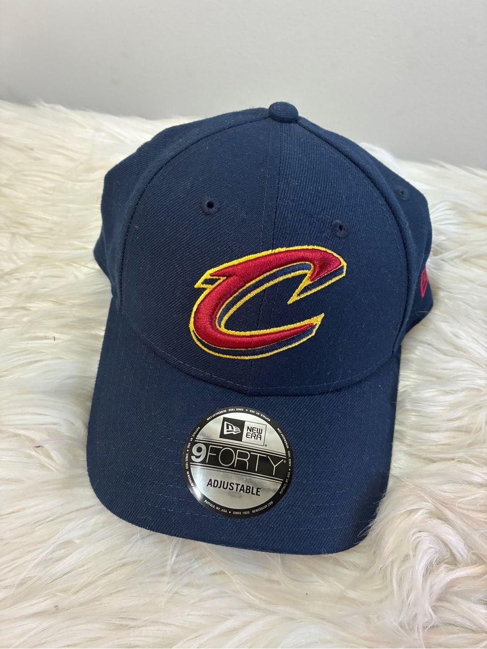 New Era Navy Cleveland Cavaliers 9FORTY Adjustable Hat with Red and Gold Logo